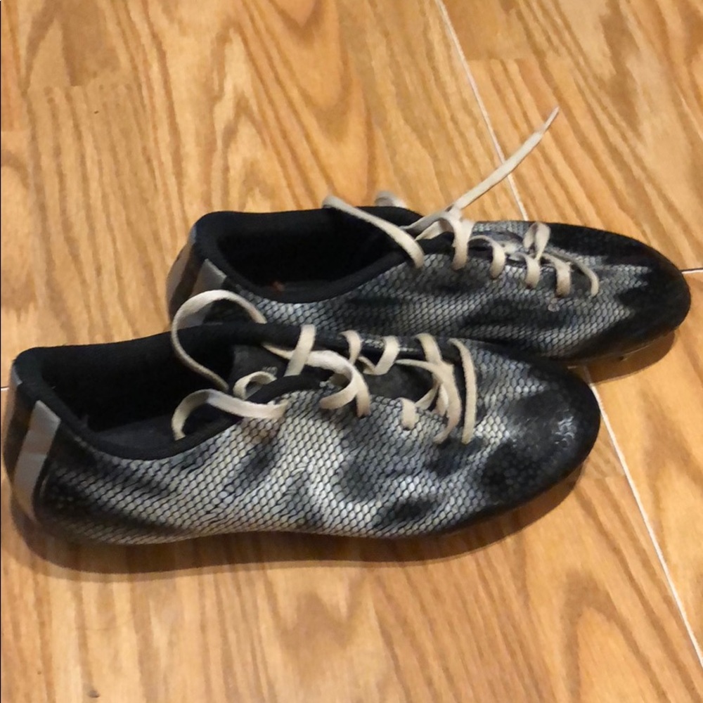 Black and white cleats